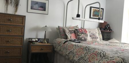 Bedroom with hoyer and overhead bar