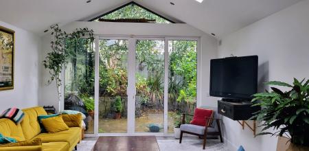 Open plan sitting room, taken from the dining room