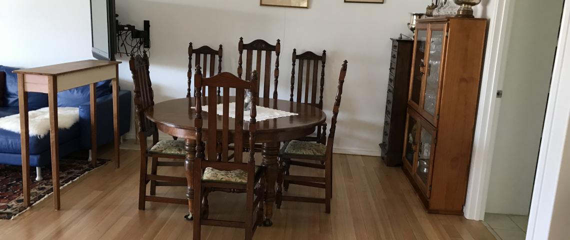 The dining table extends to seat 12 and I keep it down for 4-6. The doorway on the right is into the cellar/storeroom which has a second fridge