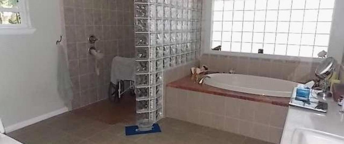 roll in shower is in master bath attached to master bedroom